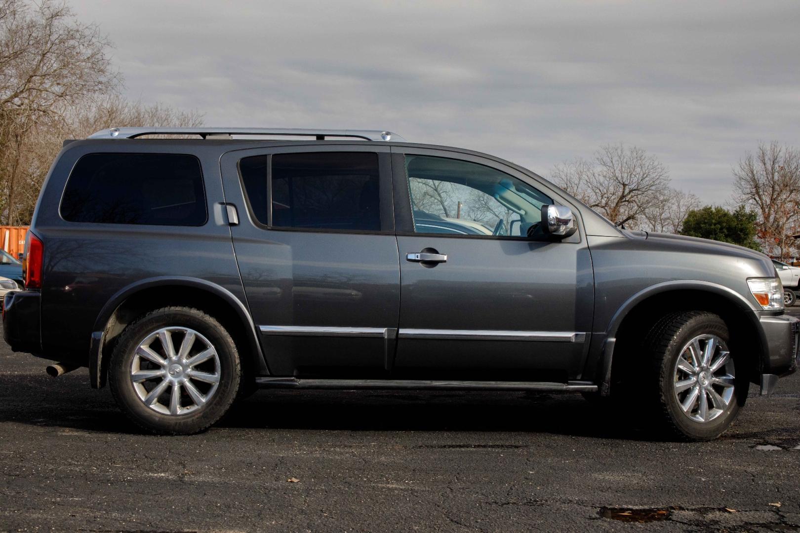 2008 BLACK INFINITI QX56 AWD (5N3AA08C48N) with an 5.6L V8 DOHC 32V engine, 5-SPEED AUTOMATIC transmission, located at 420 E. Kingsbury St., Seguin, TX, 78155, (830) 401-0495, 29.581060, -97.961647 - Photo#3